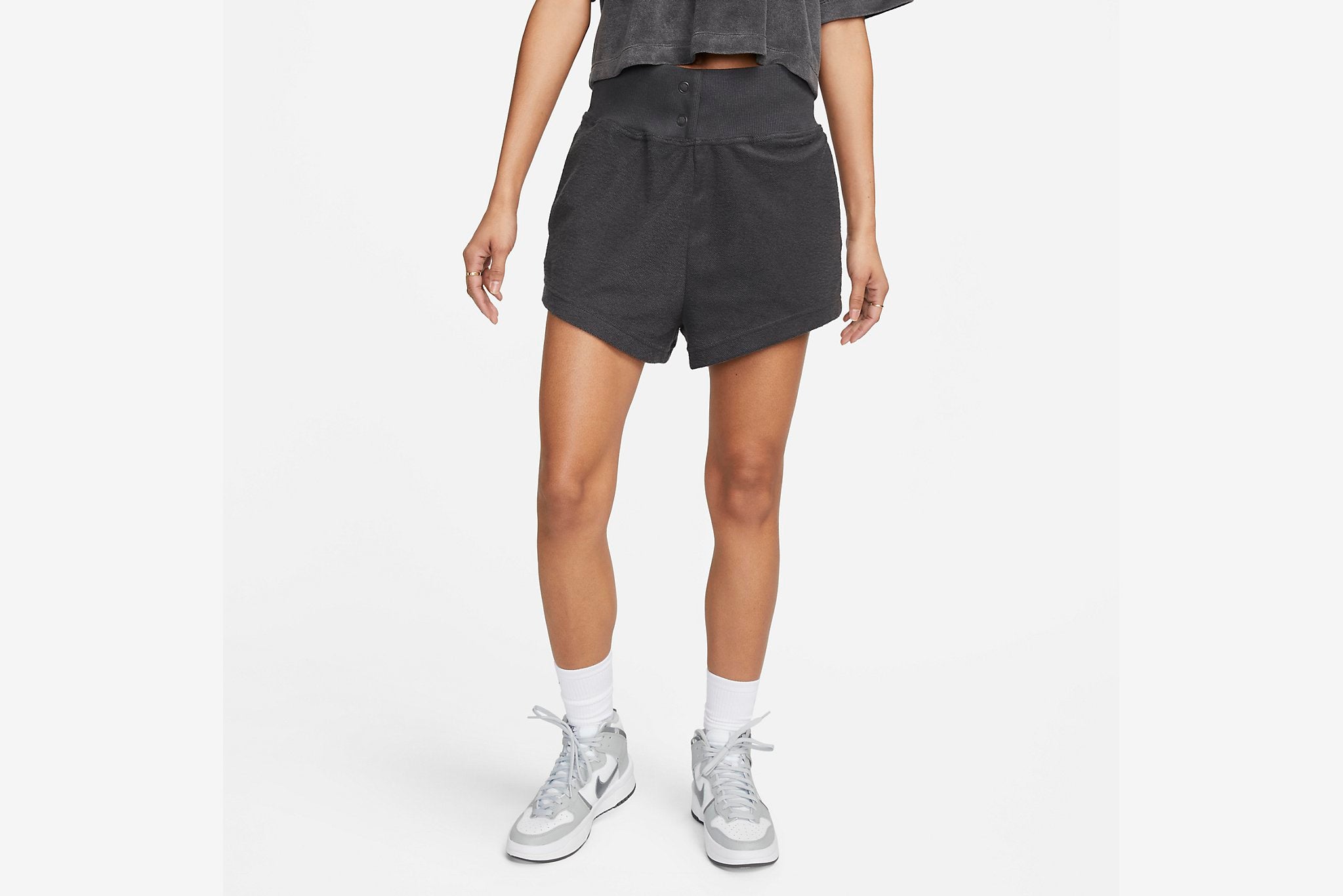 Buy Nike Air High-Waisted Woven Mini Skirt Black in Kuwait